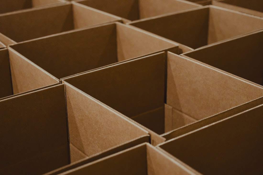 Stack of cardboard e-commerce parcels ready for dispatch